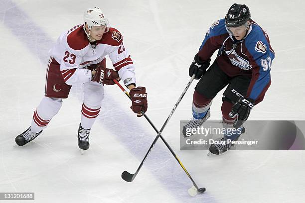Oliver Ekman-Larsson of the Phoenix Coyotes controls the puck against Gabriel Landeskog of the Colorado Avalanche at the Pepsi Center on November 2,...