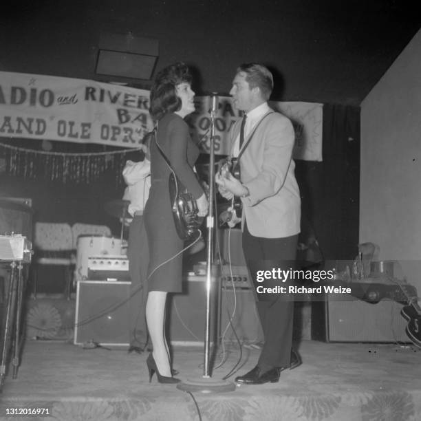 Country singer Willie Nelson performs with Shirley Collie at the Riverside Park Ballroom, December 13 in Phoenix, Arizona.