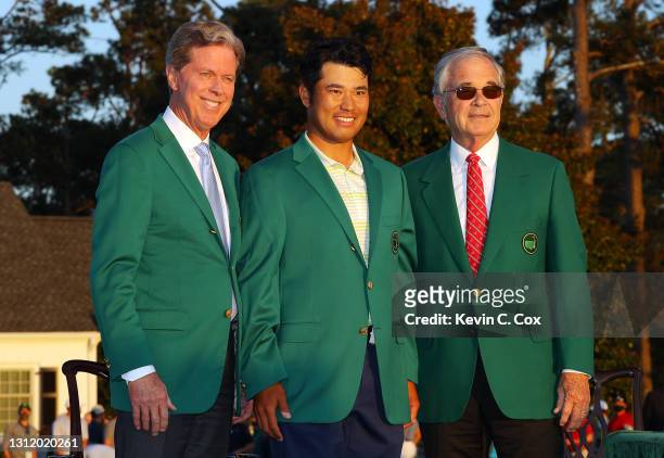 Hideki Matsuyama of Japan poses for a photo with Fred Ridley, Chairman of Augusta National Golf Club, and Billy Payne, former chairman of Augusta...