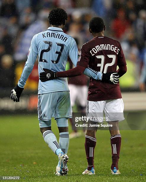 Kei Kamara of Sporting Kansas City is congratulated by Miguel Comminges of the Colorado Rapids after Sporting defeated the Rapids 2-0 to win the game...