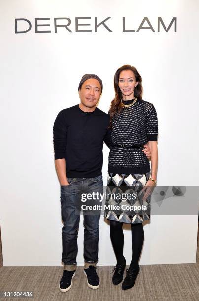 Fashion designer Derek Lam and Olivia Chantecaille appear at Neiman Marcus at Short Hills Mall on November 2, 2011 in Short Hills, New Jersey.