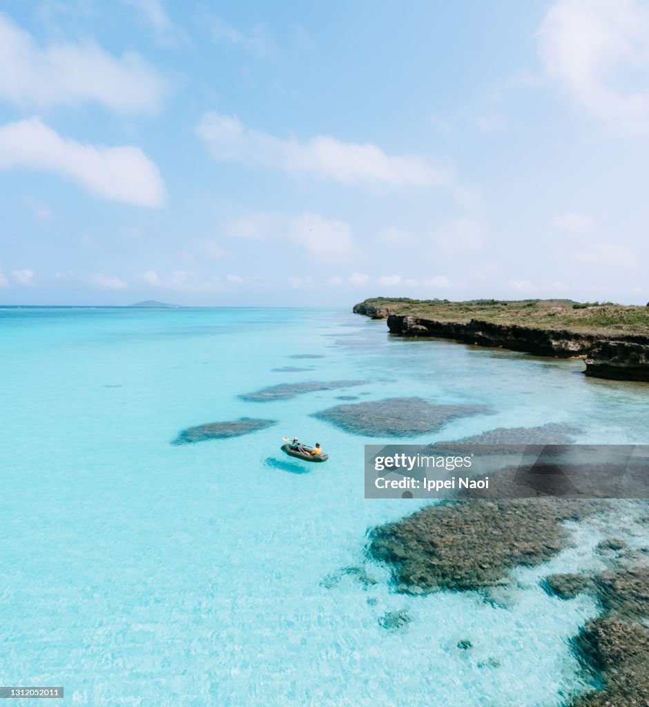Aerial view of coral-reef lagoon with kayak, Miyako Island, Okinawa, Japan
