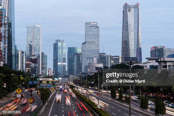 rush hour in jakarta modern business district in indonesia capital city - newly industrialized country stock pictures, royalty-free photos & images