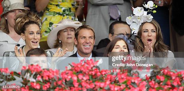 Sarah Jessica Parker, Shane Warne and Elizabeth Hurley attend the Crown box during Crown Oaks Day at Flemington Racecourse on November 3, 2011 in...