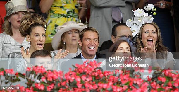 Sarah Jessica Parker, Shane Warne and Elizabeth Hurley attend the Crown box during Crown Oaks Day at Flemington Racecourse on November 3, 2011 in...