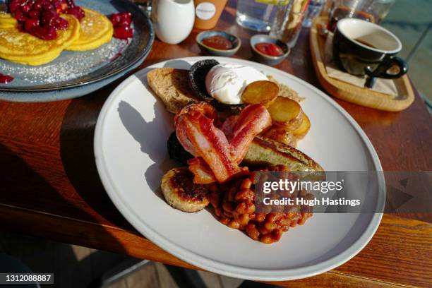 Full English Breakfast on the terrace at the Indidog brasserie, as outdoor hospitality restarts on April 12, 2021 in Falmouth, England. England has...