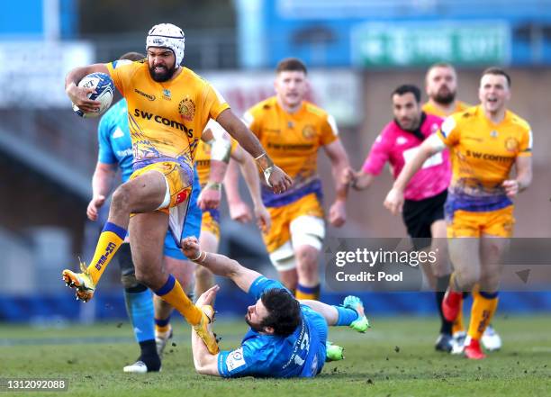 Tom O'Flaherty of Exeter Chiefs breaks through a tackle from Robbie Henshaw of Leinster during the Heineken Champions Cup Quarter Final match between...