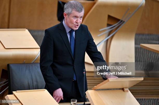 Leader of the Scottish Liberal Democrat Party Willie Rennie joins with Scottish political party leaders as they take part in a motion of condolence...