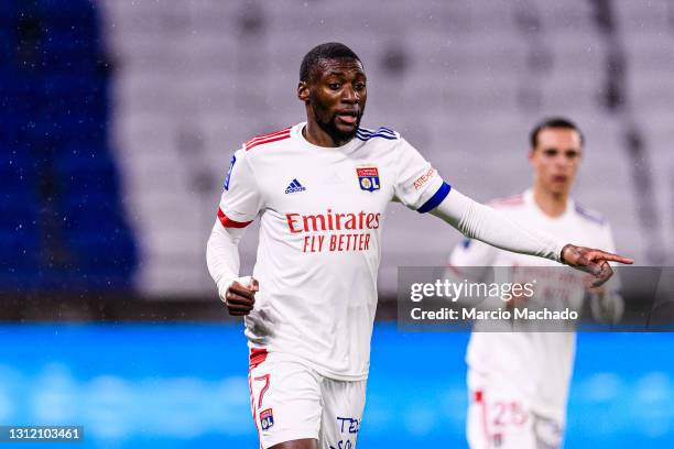 Karl Toko Ekambi of Olympique Lyon gestures during the Ligue 1 match between Olympique Lyon and Angers SCO at Groupama Stadium on April 11, 2021 in...