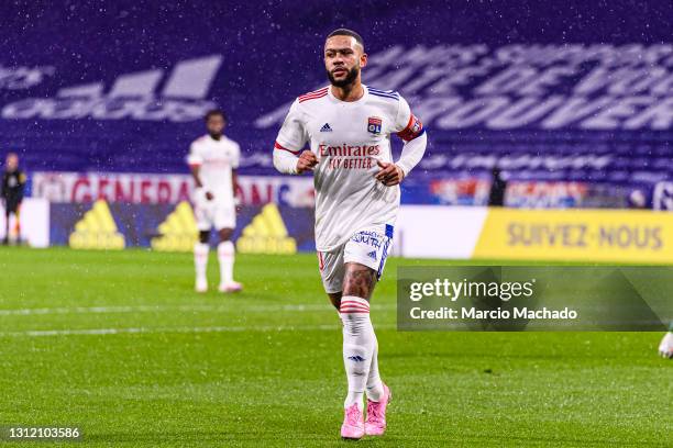 Memphis Depay of Olympique Lyon runs in the field during the Ligue 1 match between Olympique Lyon and Angers SCO at Groupama Stadium on April 11,...