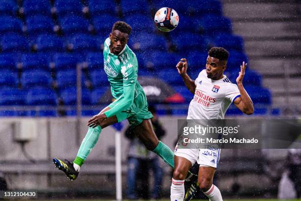 Abdoulaye Bamba of Angers in action against Thiago Mendes of Olympique Lyon during the Ligue 1 match between Olympique Lyon and Angers SCO at...