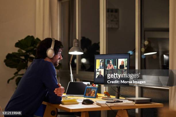 freelance worker discussing during video call - telecommuting stock pictures, royalty-free photos & images