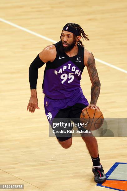 DeAndre' Bembry of the Toronto Raptors in action against the New York Knicks during a game at Madison Square Garden on April 11, 2021 in New York...