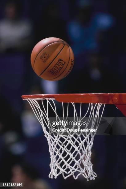 General detail view of a Spalding basketball dropping into the hoop to score during the NBA Atlantic Division basketball game between the Washington...