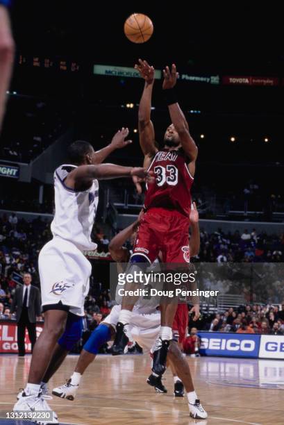 Alonzo Mourning, Center and Power Forward for the Miami Heat shoots for the basket during the NBA Atlantic Division basketball game against the...