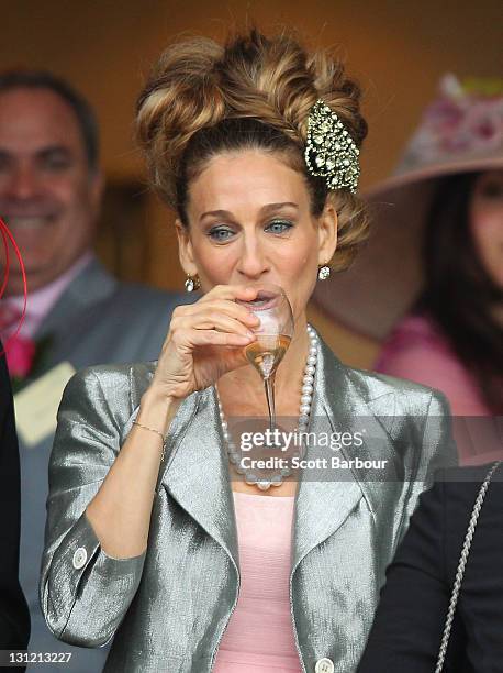 Sarah Jessica Parker has a drink during Crown Oaks Day at Flemington Racecourse on November 3, 2011 in Melbourne, Australia.