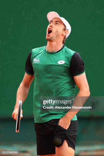 John Millman of Australia celebrates match point after winning his Singles Match against Ugo Humbert of France during the First Round of the Rolex...