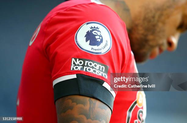 Detailed view of a 'No room for racism' badge during the Premier League match between West Bromwich Albion and Southampton at The Hawthorns on April...