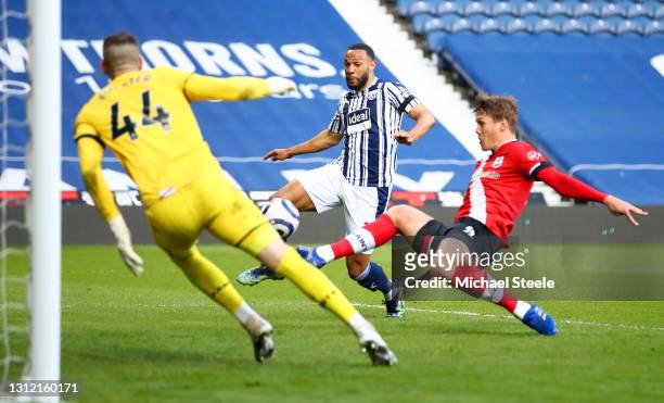 Matt Phillips of West Bromwich Albion scores their sides second goal past Fraser Forster of Southampton during the Premier League match between West...