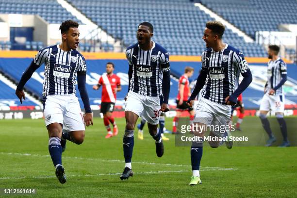 Matheus Pereira of West Bromwich Albion celebrates after scoring their sides first goal with team mates Ainsley Maitland-Niles and Callum Robinson of...