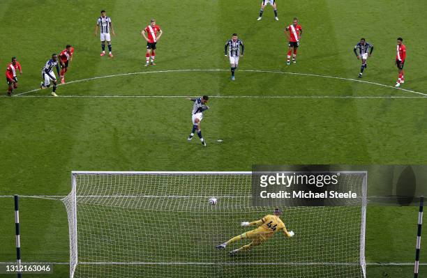 Matheus Pereira of West Bromwich Albion scores their sides first goal from the penalty spot past Fraser Forster of Southampton during the Premier...
