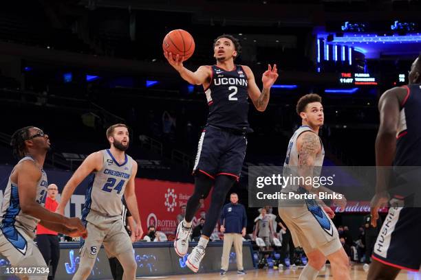 James Bouknight of the Connecticut Huskies goes in for a layup against the Creighton Bluejays during a Big East Tournament semifinal game at Madison...