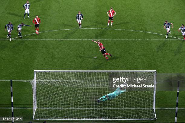 Sam Johnstone of West Bromwich Albion saves a penalty from James Ward-Prowse of Southampton during the Premier League match between West Bromwich...