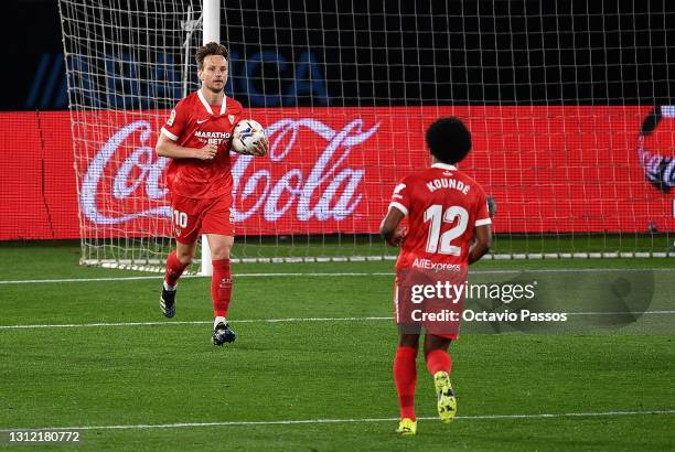 Ivan Rakitic of Sevilla celebrates after scoring their sides third goal during the La Liga Santander match between RC Celta and Sevilla FC at...