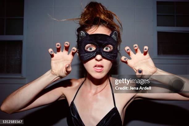 woman halloween costume, cat costume - cat face mask stock pictures, royalty-free photos & images