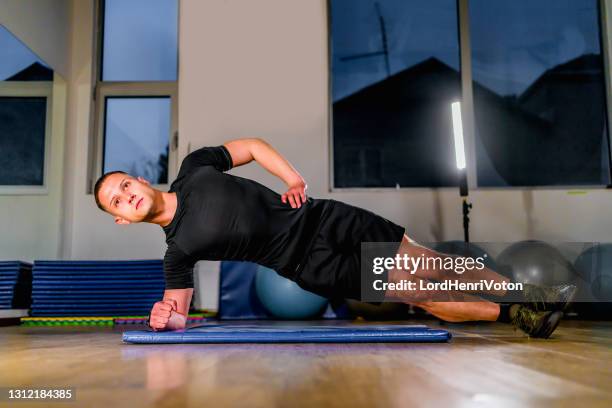 side plank position - side plank pose stock pictures, royalty-free photos & images