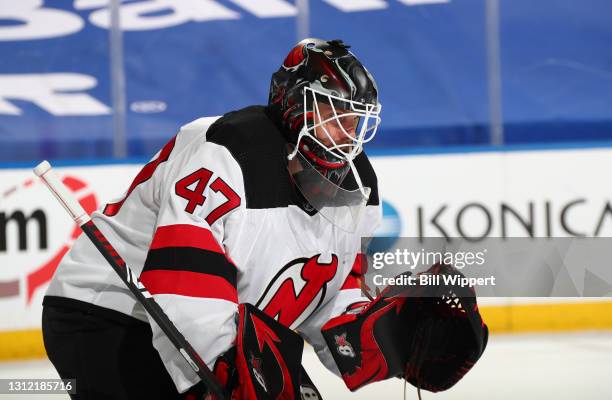 Aaron Dell of the New Jersey Devils tends goal against the Buffalo Sabres during an NHL game on April 8, 2021 at KeyBank Center in Buffalo, New York.