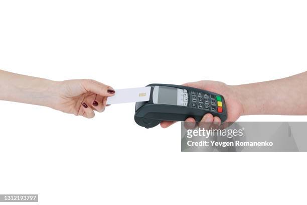 woman pays by credit card, contactless payment with credit card reader machine - card reader stockfoto's en -beelden