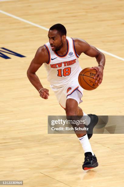 Alec Burks of the New York Knicks in action against the Toronto Raptors during a game at Madison Square Garden on April 11, 2021 in New York City....