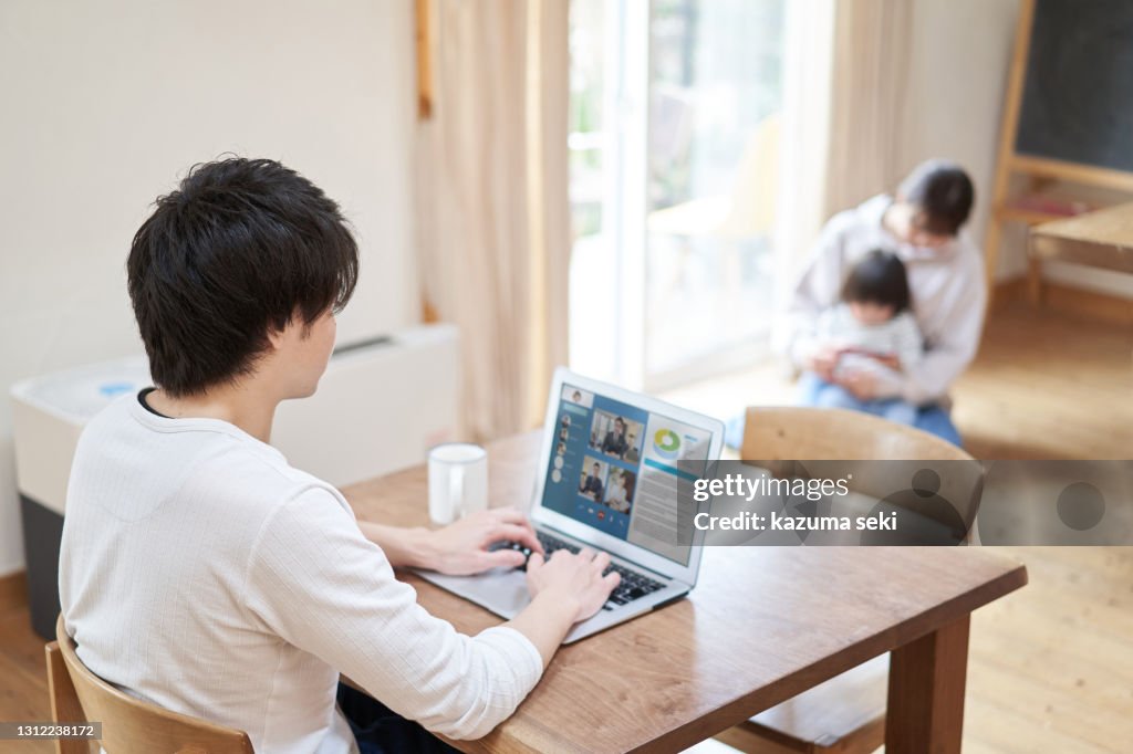 Asian men having an online meeting on telework