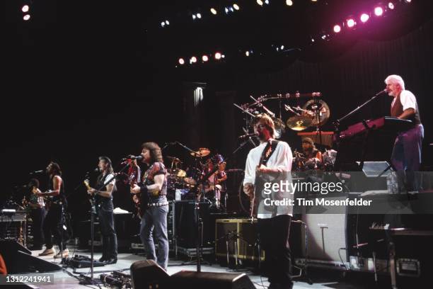 Patrick Simmons, Tom Johnston, John McFee, and Michael McDonald of the Doobie Brothers perform at Shoreline Amphitheatre on September 8, 1995 in...
