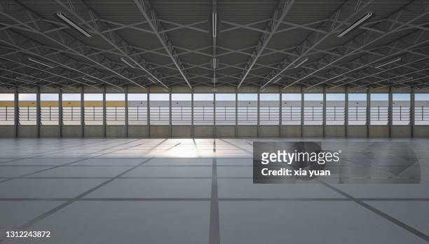 empty modern warehouse - ceiling light stockfoto's en -beelden