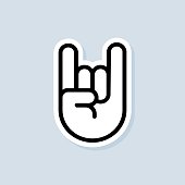 Rock and Roll sticker. Hand gesture of human. Two fingers raised up. Vector on isolated white background. EPS 10
