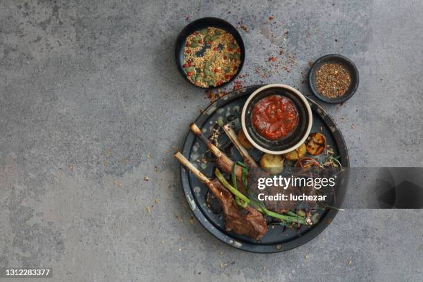 grilled rack of lamb - rack of lamb overhead stock pictures, royalty-free photos & images