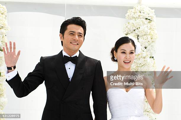 Jang Dong-Gun and Go So-Young pose for photographs during their Wedding at the Shilla Hotel on May 2, 2010 in Seoul, South Korea.