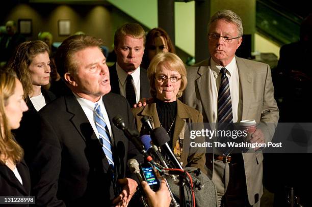 Montgomery County State's Attorney John McCarthy speaks with members of the media alongside Phyllis and David Murray following the guilty verdict of...