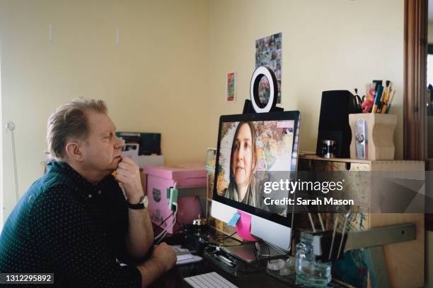 man on a zoom call - two people video conferencing stock pictures, royalty-free photos & images