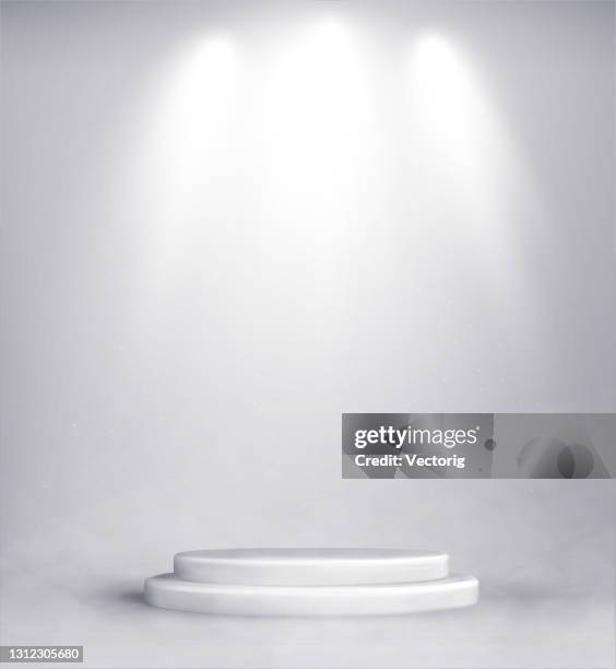 studio background with realistic podium spotlight - winner background stock illustrations