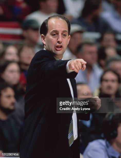 Jeff Van Gundy, Head Coach for the New York Knicks points to his players during the NBA Atlantic Division basketball game against the Orlando Magic...