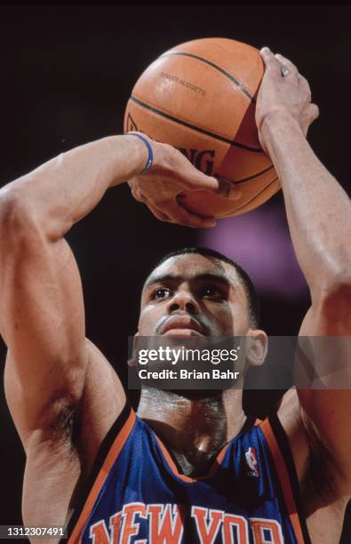 Allan Houston, Shooting Guard for the New York Knicks prepares to make a free throw during the NBA Midwest Division basketball game against the...