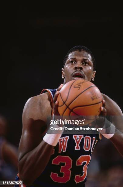 Patrick Ewing, Power Forward and Center for the New York Knicks prepares to shoot a free throw during the NBA Midwest Division basketball game...