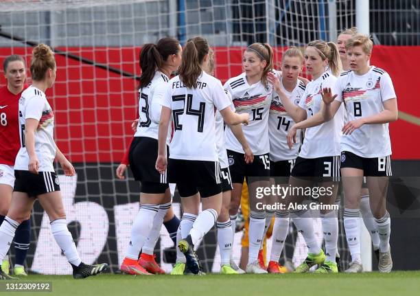 Laura Freigang of Germany celebrate with her team mates after she scores the equalizing goal during the Women's International Friendly match between...