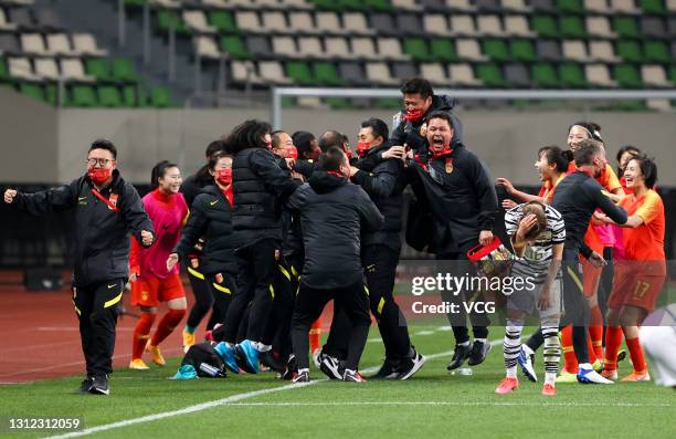 Players of China celebrate victory after the Tokyo Olympics Women's Football Asian Final Qualifier 2nd leg match between China and South Korea at the...