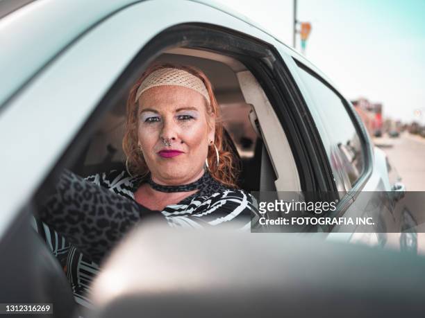 Transgender woman driving her car