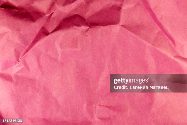 abstract purple pink crumpled paper for gift wrapping or packaging. close up, texture background - brown paper texture stock pictures, royalty-free photos & images