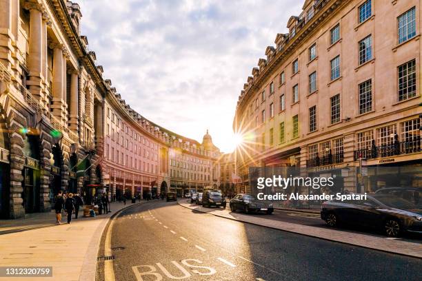 regent street at sunset, london, england, uk - london stockfoto's en -beelden